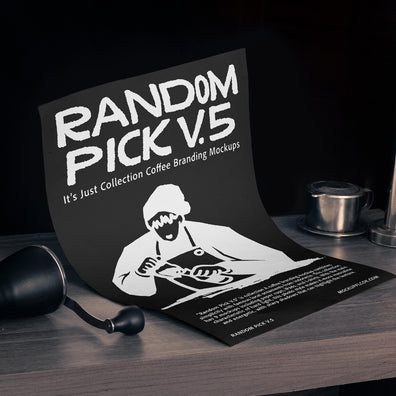 Black A4 paper poster leaning upright on a dark wooden bar counter with a coffee grinder and Vietnamese drip filter beside it against a dark background for coffee brand poster mockup
