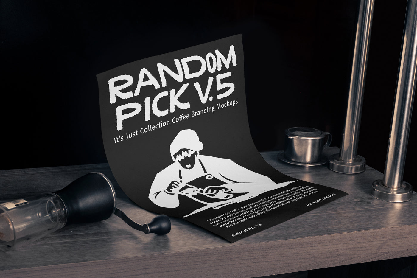 Black A4 paper poster leaning upright on a dark wooden bar counter with a coffee grinder and Vietnamese drip filter beside it against a dark background for coffee brand poster mockup