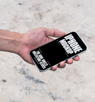 A person is holding an iPhone that says "IPHONE MOCKUP THE COOL BREEZE COLLECTION @2025" in bold white text. Design by Mockup Flock