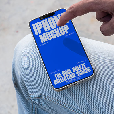 A person is touching an iPhone that says "IPHONE MOCKUP THE COOL BREEZE COLLECTION @2025" in bold white text. Design by Mockup Flock