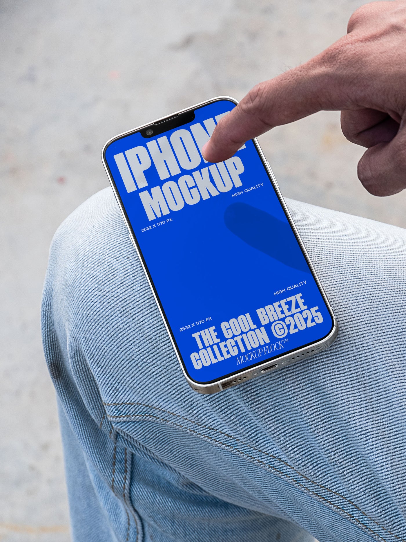 A person is touching an iPhone that says "IPHONE MOCKUP THE COOL BREEZE COLLECTION @2025" in bold white text. Design by Mockup Flock
