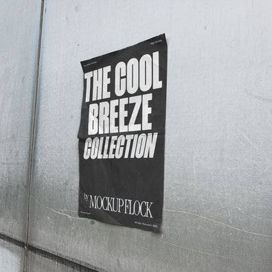 Mockup of a black vertical poster attached to a wall with a paper texture inside. Design by Mockup Flock