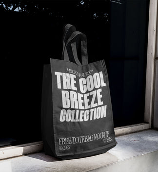 A black poster with white text reading THE COOL BREEZE COLLECTION BY MOCKUP FLOCK, is stuck to the window.