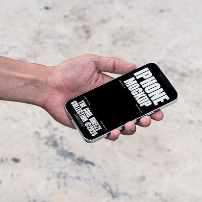 A person is holding an iPhone that says "IPHONE MOCKUP THE COOL BREEZE COLLECTION @2025" in bold white text. Design by Mockup Flock