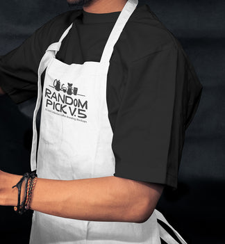 Side view of a barista wearing a white apron leaning against a metal shelf in a moody cafe environment, ideal for staff uniform branding mockup