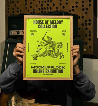 Free Wooden Frame Poster Mockup PSD held by person in Music Studio with Guitar and Amp - MockupFlock