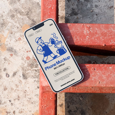 Free iPhone Mockup on Rusty Red Metal and Concrete Background - Industrial Style MockupFlock
