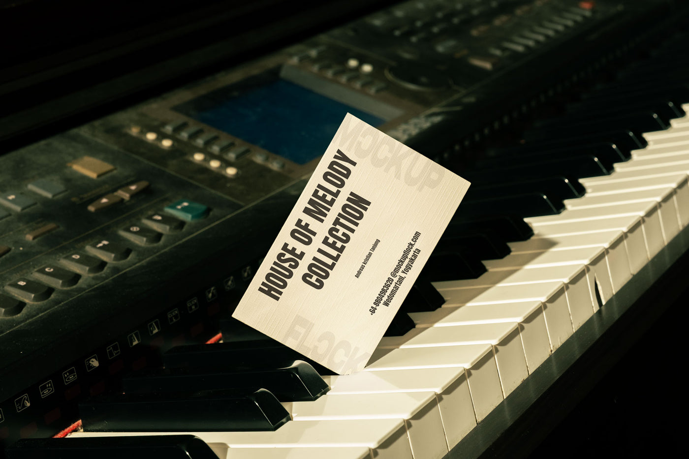 High quality business card mockup leaning on a piano. Aesthetic print mockup created for Adobe Photoshop