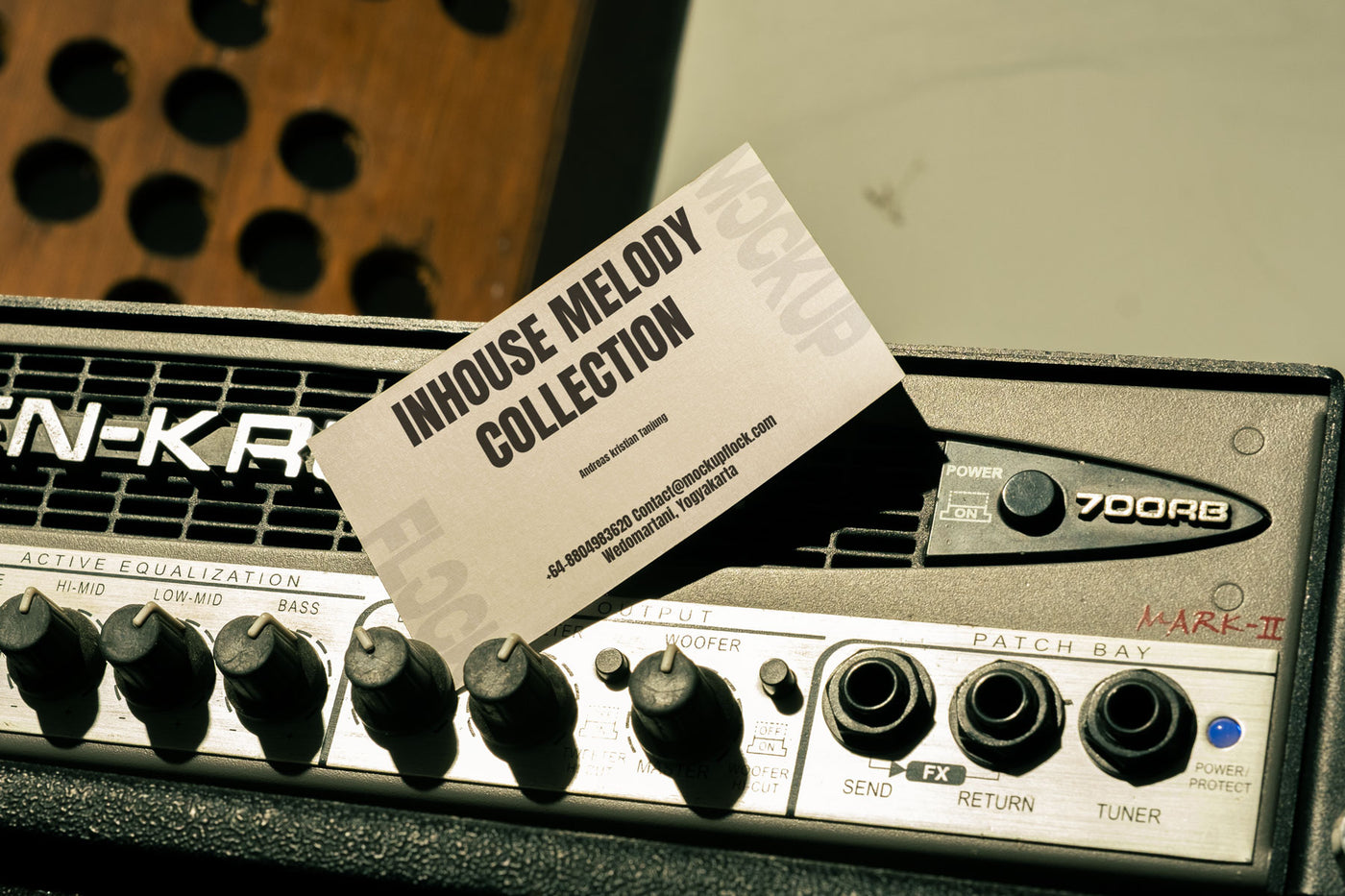High quality business card mockup leaning on a equalizer . Aesthetic print mockup created for Adobe Photoshop