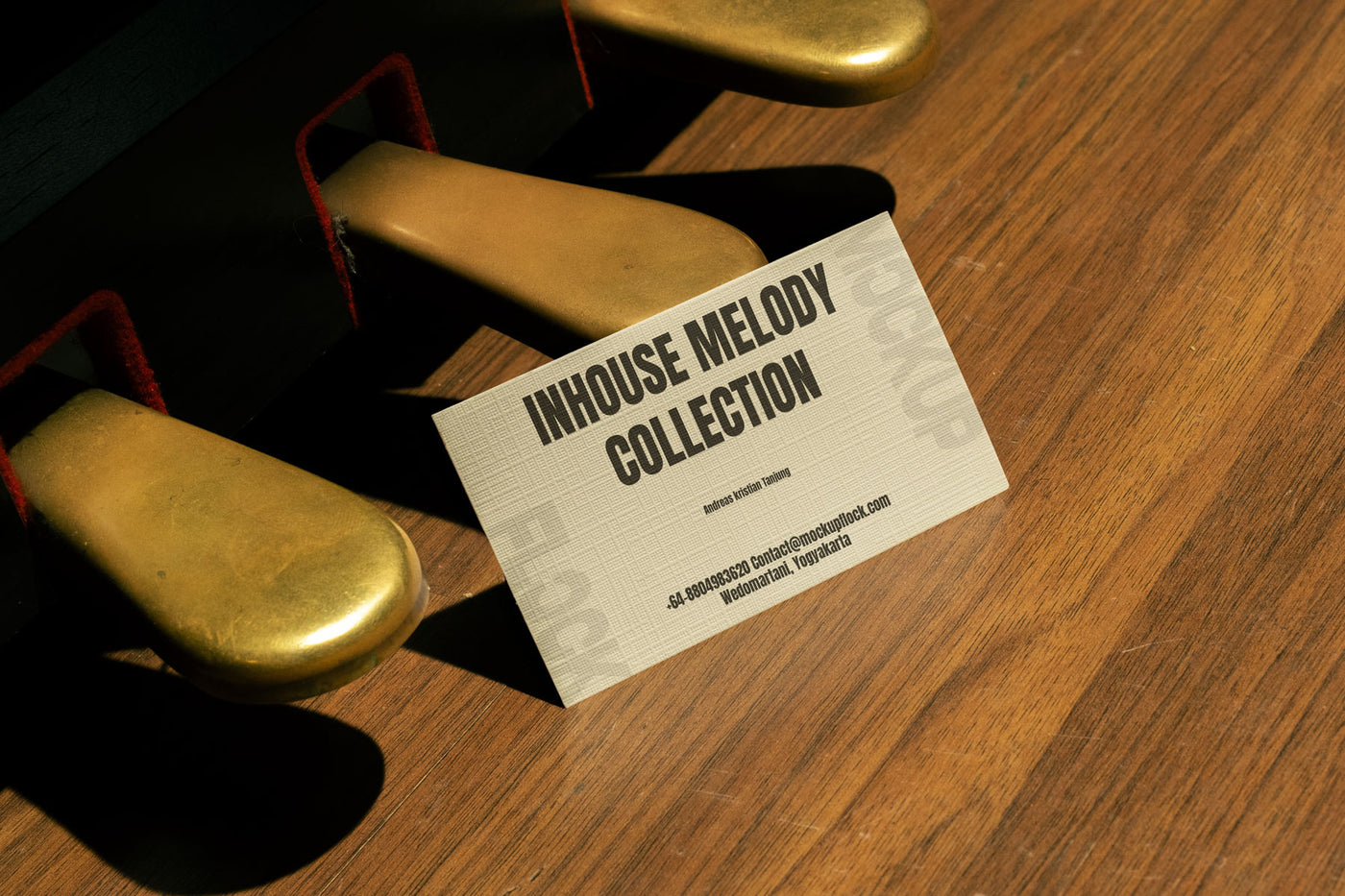 High quality business card mockup leaning on a pedal piano. Aesthetic print mockup created for Adobe Photoshop
