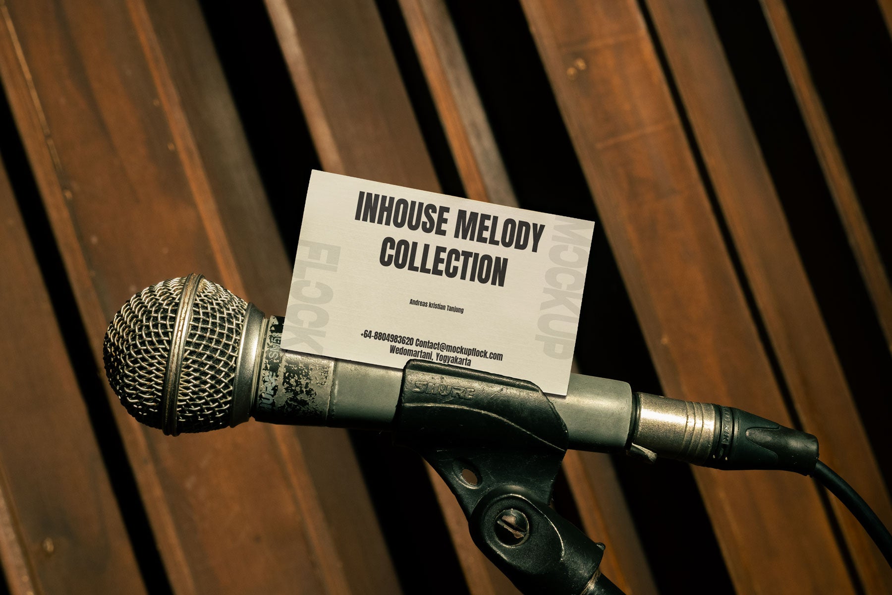 High quality business card mockup leaning on a mic hardware. Aesthetic print mockup created for Adobe Photoshop