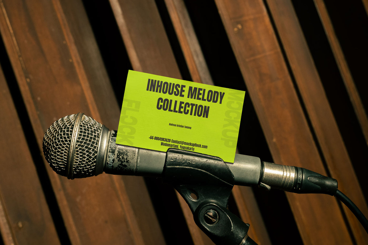 High quality business card mockup leaning on a mic hardware. Aesthetic print mockup created for Adobe Photoshop