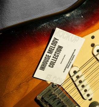 High quality business card mockup leaning on a electric guitar. Aesthetic print mockup created for Adobe Photoshop