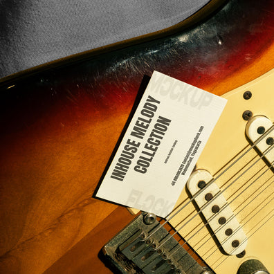 High quality business card mockup leaning on a electric guitar. Aesthetic print mockup created for Adobe Photoshop