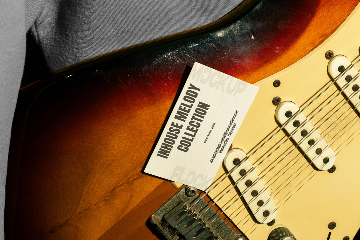 High quality business card mockup leaning on a electric guitar. Aesthetic print mockup created for Adobe Photoshop