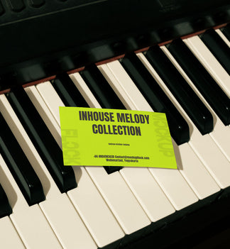 High quality business card mockup leaning on a piano. Aesthetic print mockup created for Adobe Photoshop