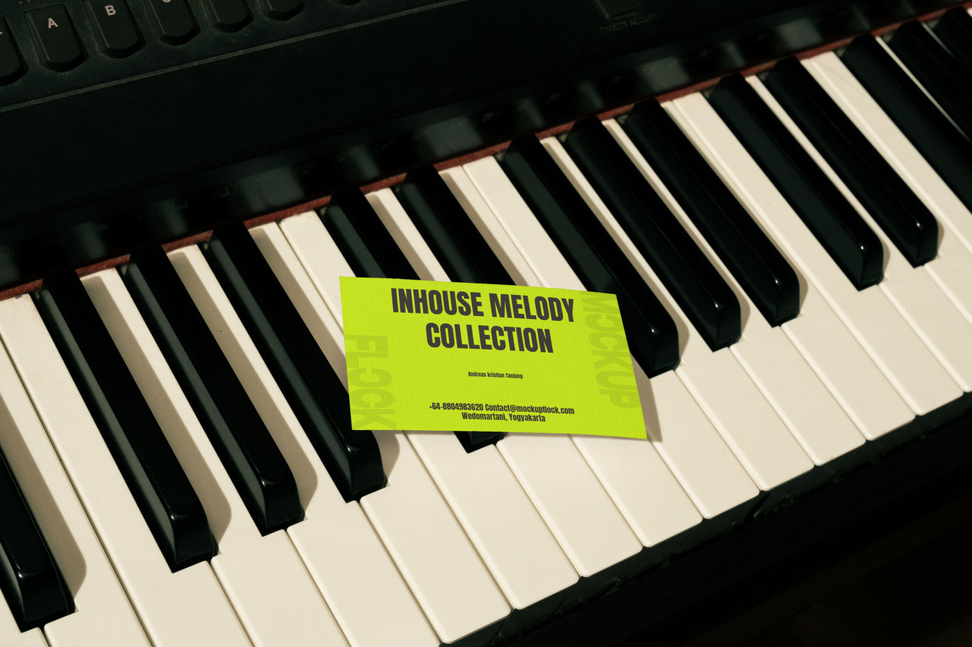 High quality business card mockup leaning on a piano. Aesthetic print mockup created for Adobe Photoshop
