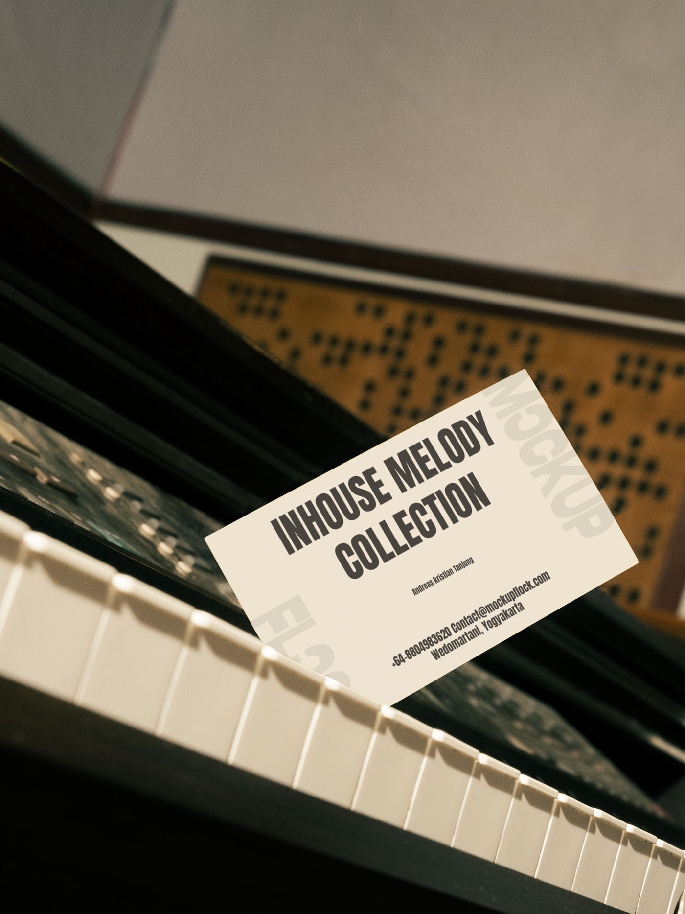 High quality business card mockup leaning on a piano. Aesthetic print mockup created for Adobe Photoshop