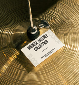 High quality business card mockup leaning on a cymbal drums. Aesthetic print mockup created for Adobe Photoshop