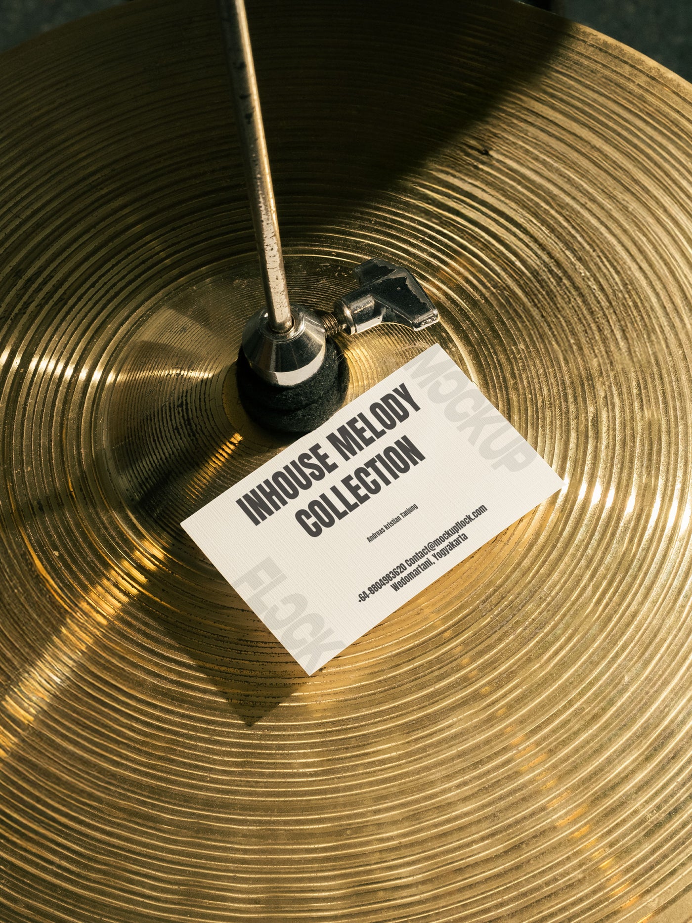 High quality business card mockup leaning on a cymbal drums. Aesthetic print mockup created for Adobe Photoshop