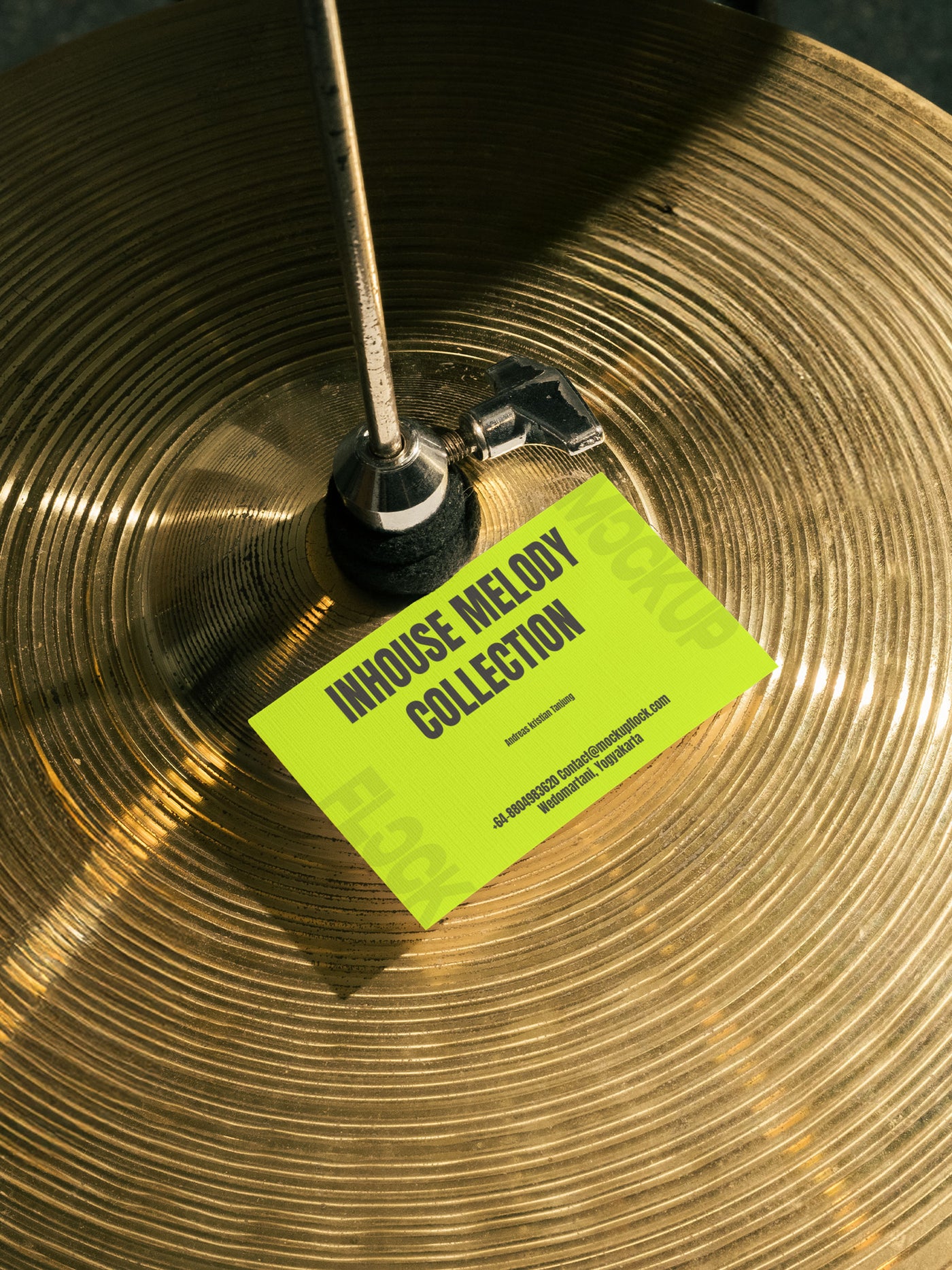 High quality business card mockup leaning on a cymbal drums. Aesthetic print mockup created for Adobe Photoshop