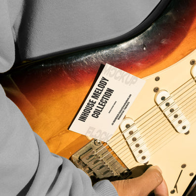 High quality business card mockup leaning on a electric guitar. Aesthetic print mockup created for Adobe Photoshop