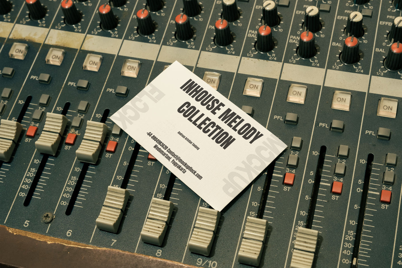 High quality business card mockup leaning on a analog mixer. Aesthetic print mockup created for Adobe Photoshop