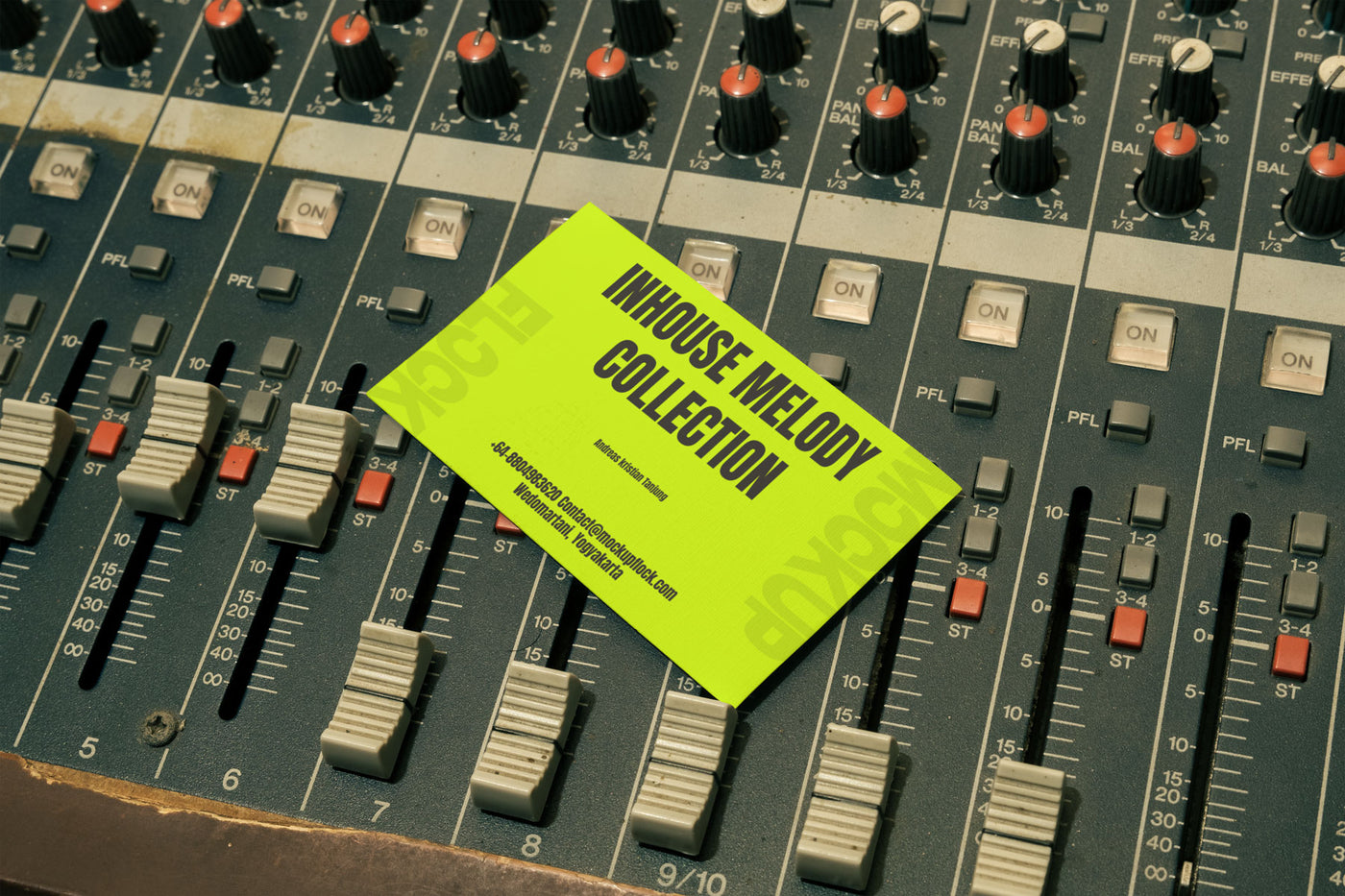 High quality business card mockup leaning on a analog mixer. Aesthetic print mockup created for Adobe Photoshop