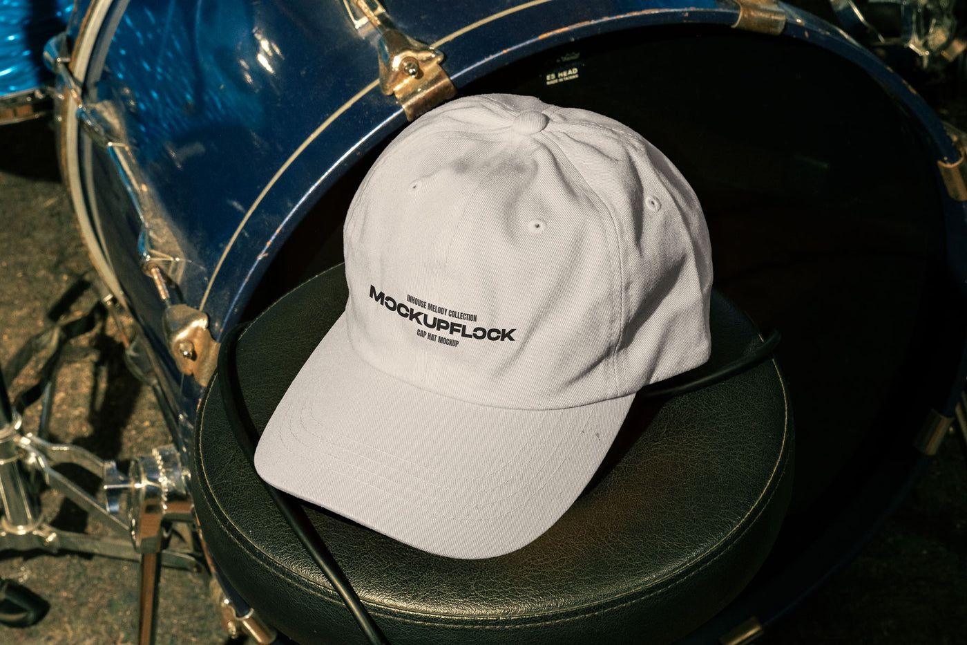 High quality hat mockup leaning on a drum throne. Aesthetic print mockup created for Adobe Photoshop