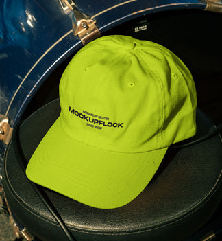 High quality hat mockup leaning on a drum throne. Aesthetic print mockup created for Adobe Photoshop