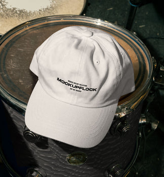High quality hat mockup leaning on a floor tom. Aesthetic print mockup created for Adobe Photoshop