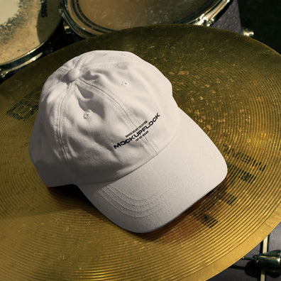 High quality cap hat mockup leaning on a cymbal drums. Aesthetic print mockup created for Adobe Photoshop