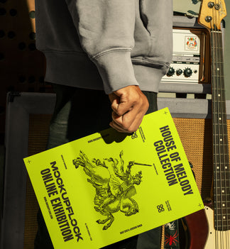 High quality poster mockup of someone holding a poster in a music studio. Aesthetic print mockup created for Adobe Photoshop