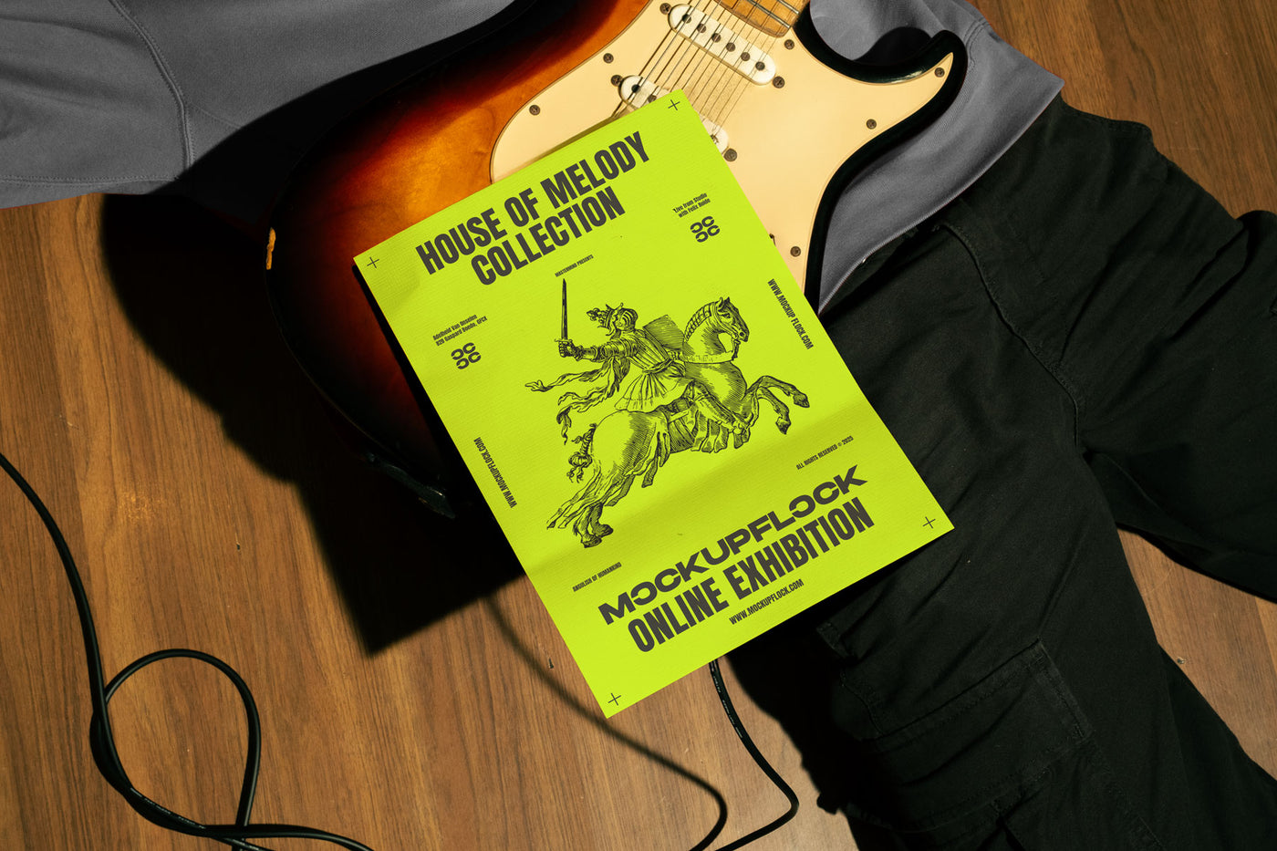 High quality poster mockup leaning on a person who holding a guitar electric in a music studio. Aesthetic print mockup created for Adobe Photoshop