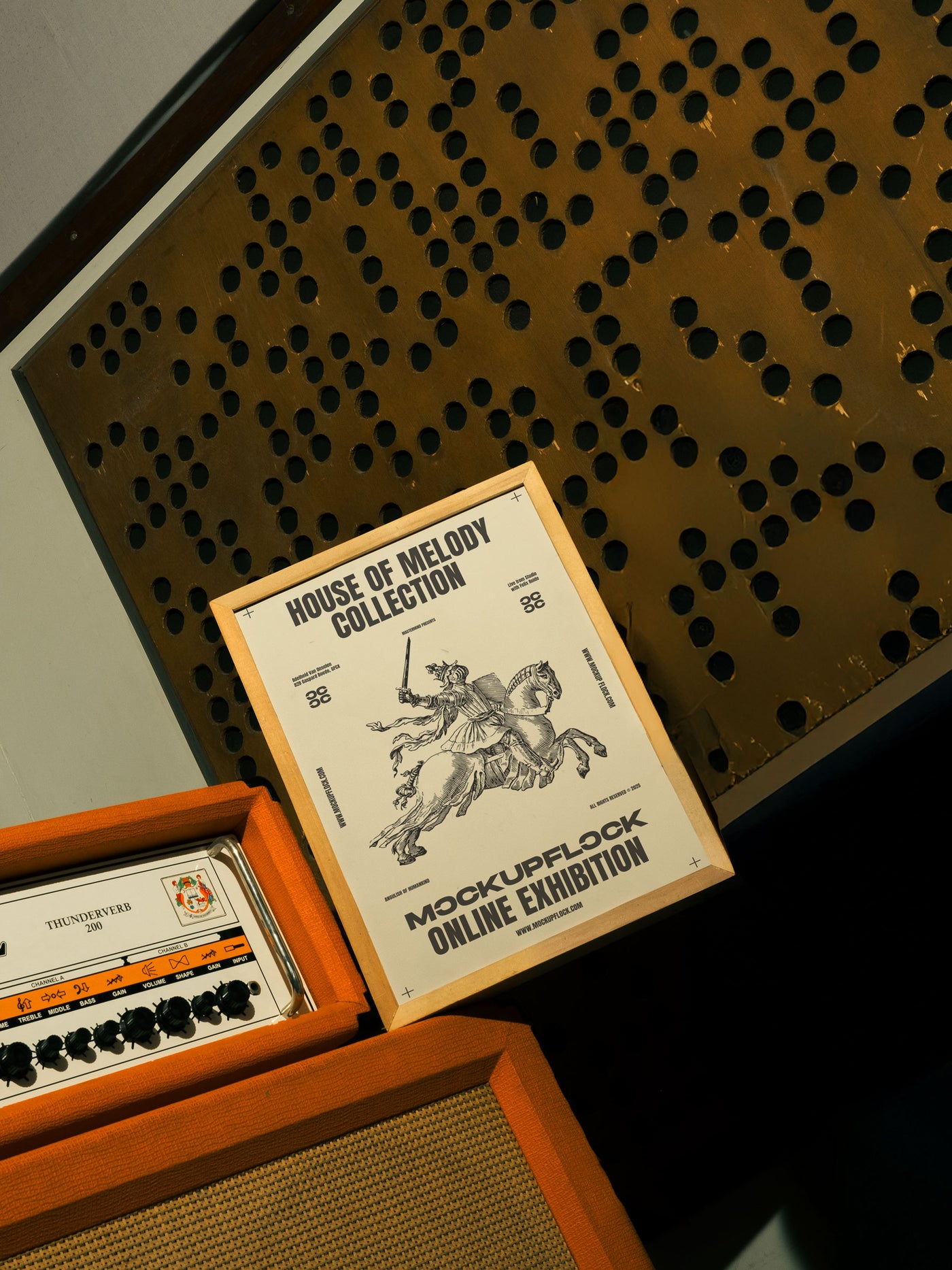 A high quality poster mockup standing on top of an amplifier in a music studio. An aesthetic print mockup created for Adobe Photoshop.