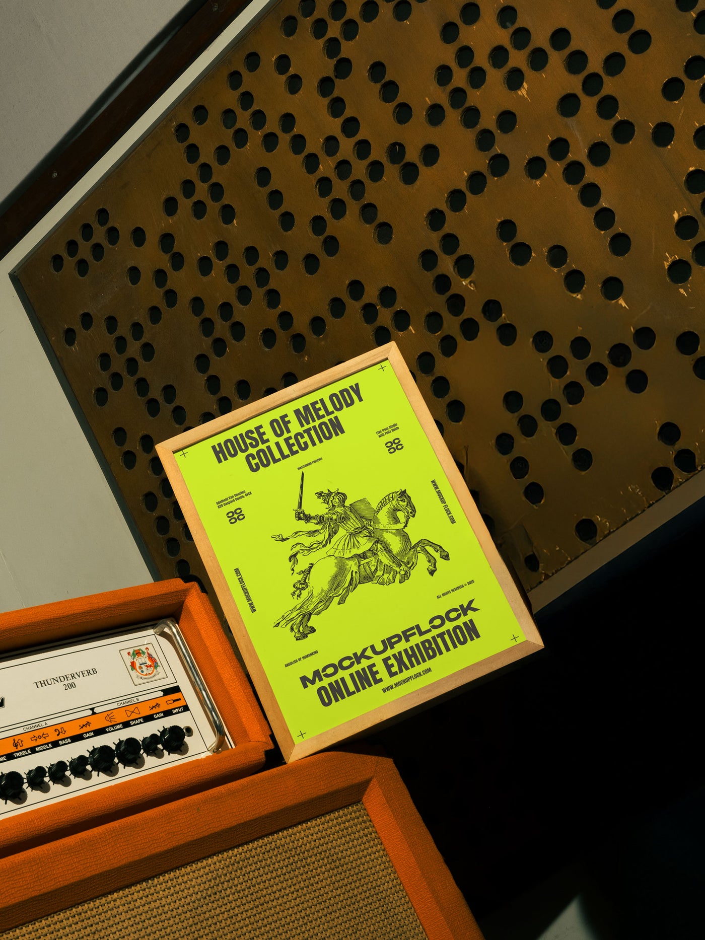 A high quality poster mockup standing on top of an amplifier in a music studio. An aesthetic print mockup created for Adobe Photoshop.