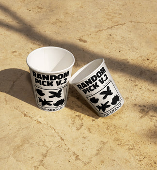 Urban paper cup mockup side by side on a urban floor