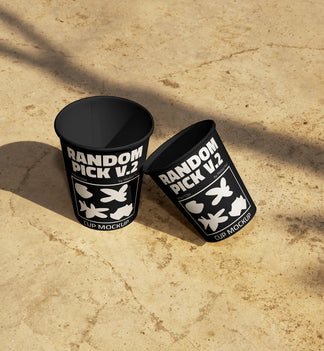 Urban paper cup mockup side by side on a urban floor