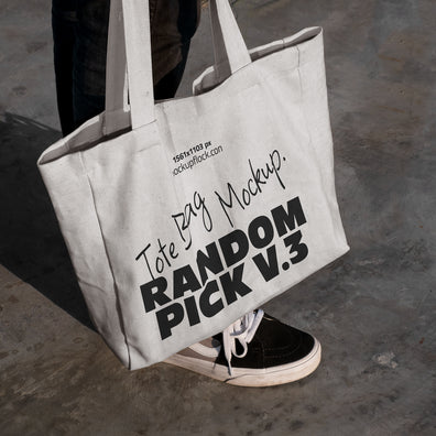 urban tote bag mockup lying on top of black shoes
