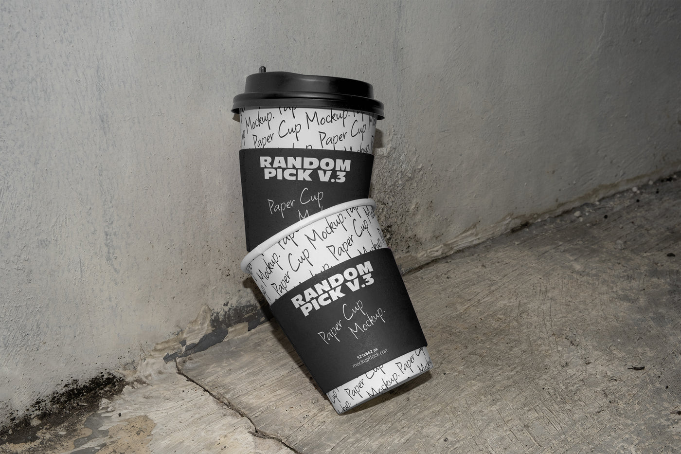 stacked urban paper cups mockup with text design on a realistic concrete floor against a gray wall