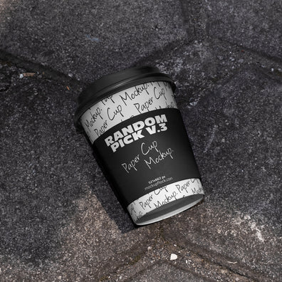 industrial paper cup mockup with a label on a realistic stone surface