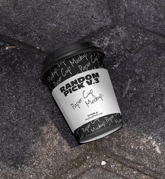 industrial paper cup mockup with a label on a realistic stone surface