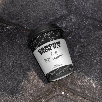 industrial paper cup mockup with a label on a realistic stone surface