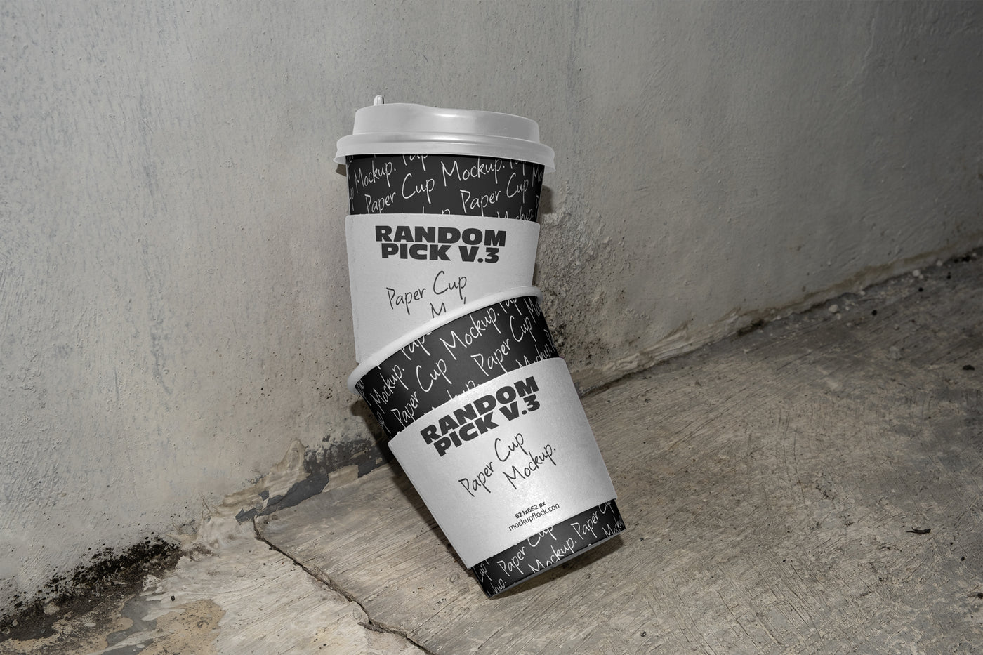 stacked urban paper cups mockup with text design on a realistic concrete floor against a gray wall