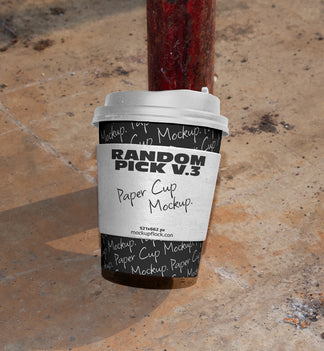 urban paper cup leaning on the leg of the chair mockup by mockup flock