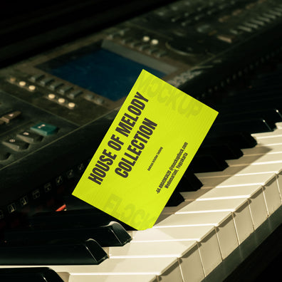 business card mockup leaning on a piano