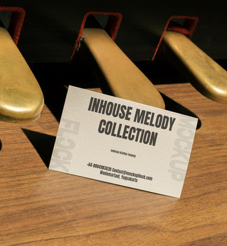 business card mockup leaning on a pedal piano