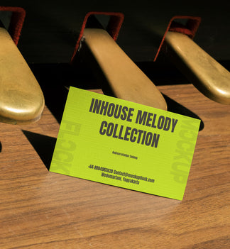 business card mockup leaning on a pedal piano