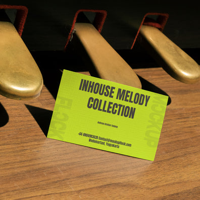 business card mockup leaning on a pedal piano