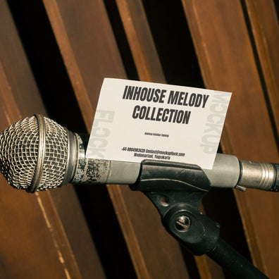 business card mockup leaning on a vocal microphone